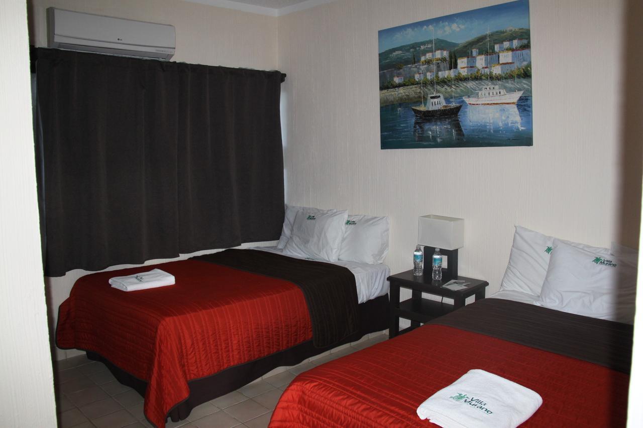 Hotel Villa Murano Puerto Arista Buitenkant foto