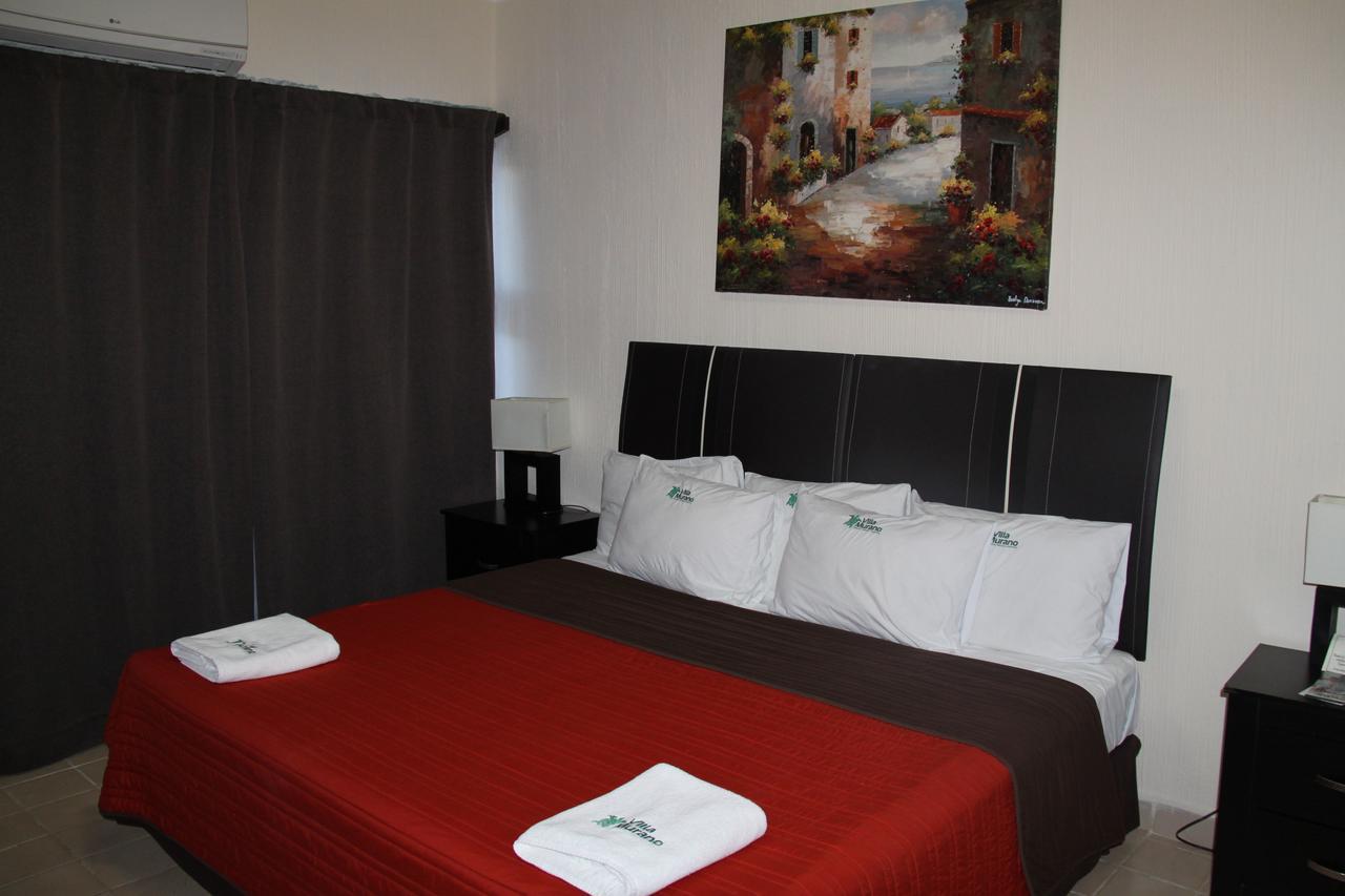 Hotel Villa Murano Puerto Arista Buitenkant foto