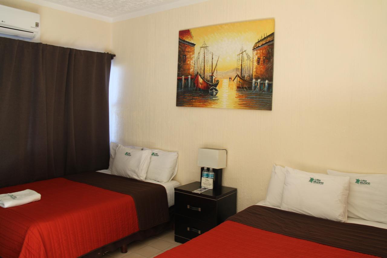 Hotel Villa Murano Puerto Arista Buitenkant foto